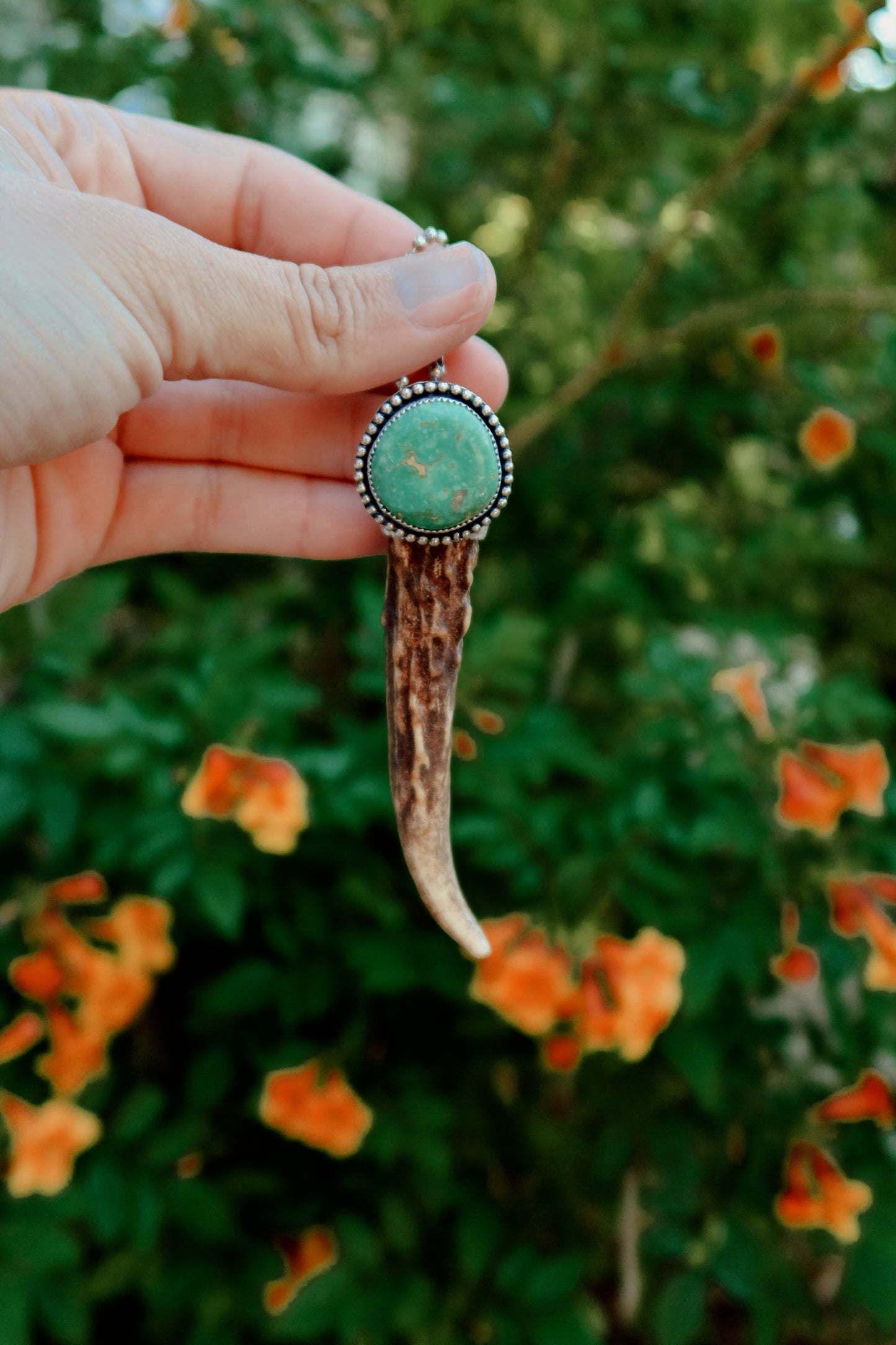 Carry a touch of enchantment with this whimsical Sterling Silver and Turquoise Antler Tip Keychain, lovingly handcrafted in South Texas. Let this magical little charm dance from your keys, dangle from your purse, or nestle close to your heart as a pendant. A sprinkle of south Texas charm wherever you wander.