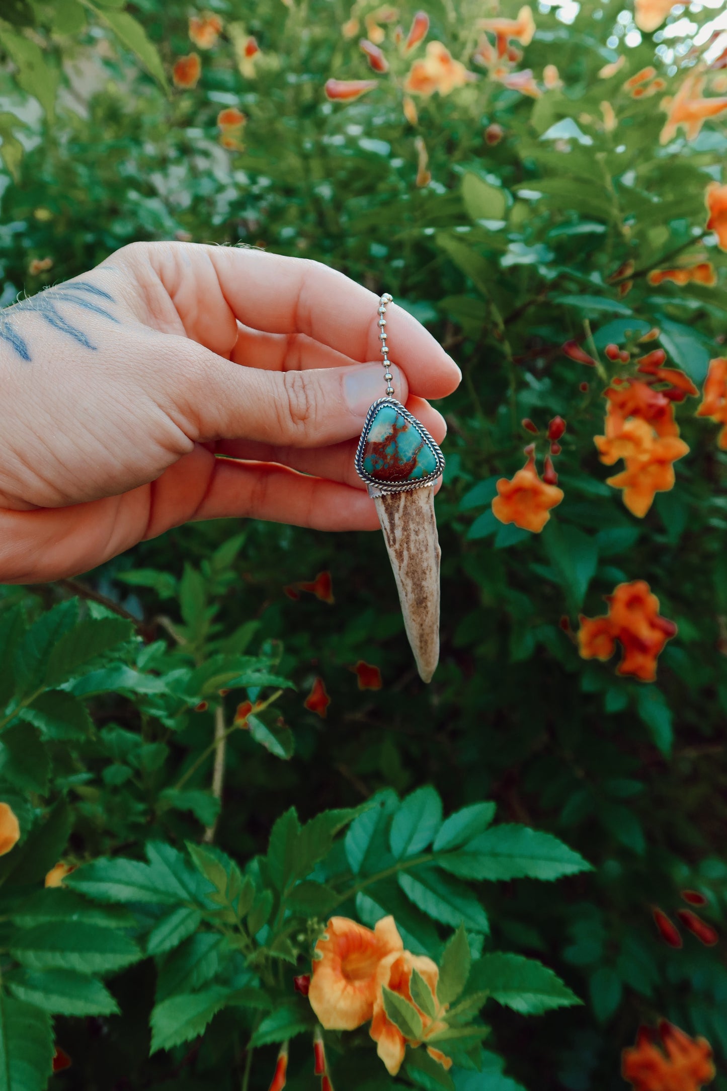 Carry a touch of enchantment with this whimsical Sterling Silver and Turquoise Antler Tip Keychain, lovingly handcrafted in South Texas. Let this magical little charm dance from your keys, dangle from your purse, or nestle close to your heart as a pendant. A sprinkle of south Texas charm wherever you wander.