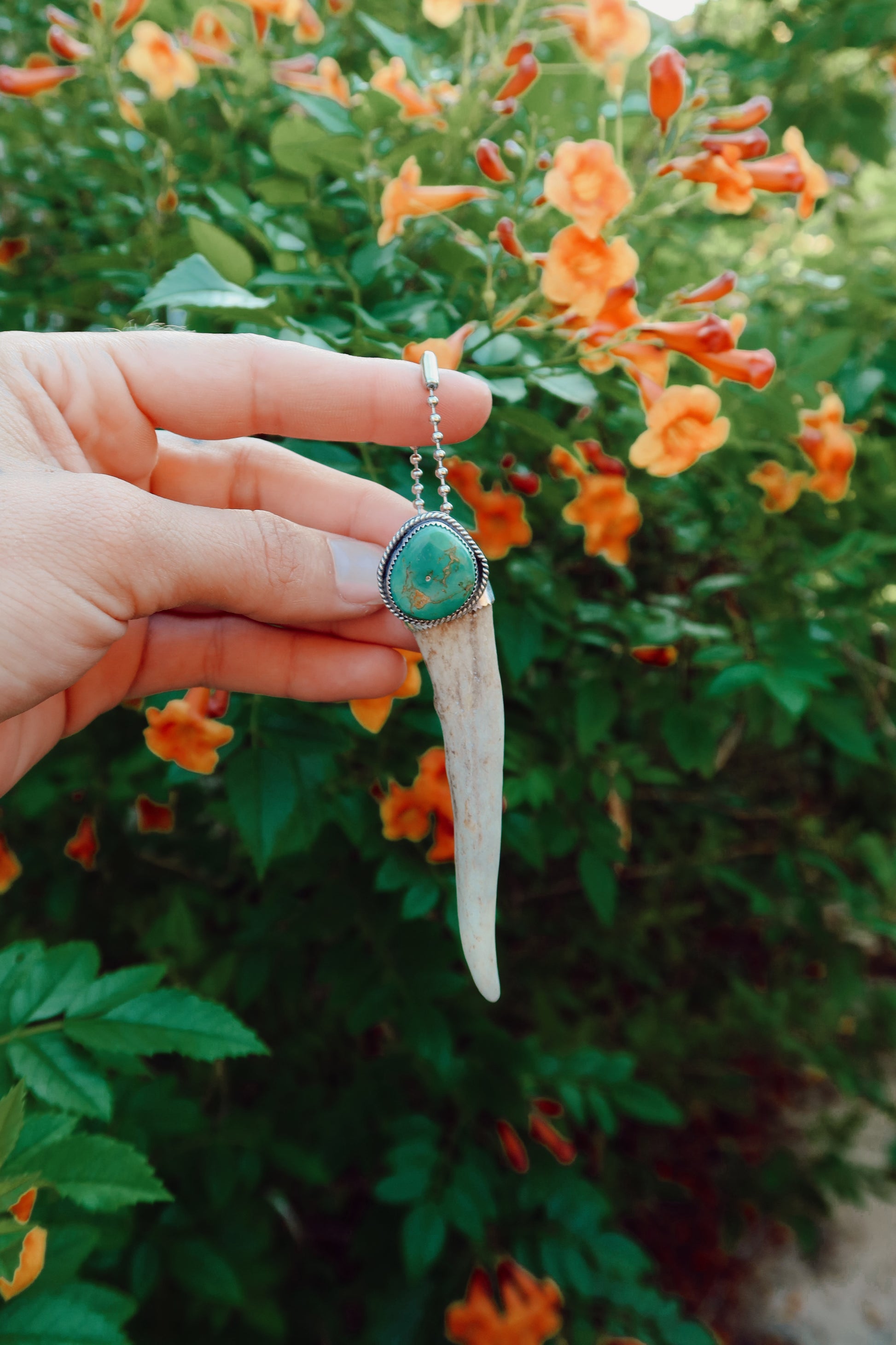 Carry a touch of enchantment with this whimsical Sterling Silver and Turquoise Antler Tip Keychain, lovingly handcrafted in South Texas. Let this magical little charm dance from your keys, dangle from your purse, or nestle close to your heart as a pendant. A sprinkle of south Texas charm wherever you wander.